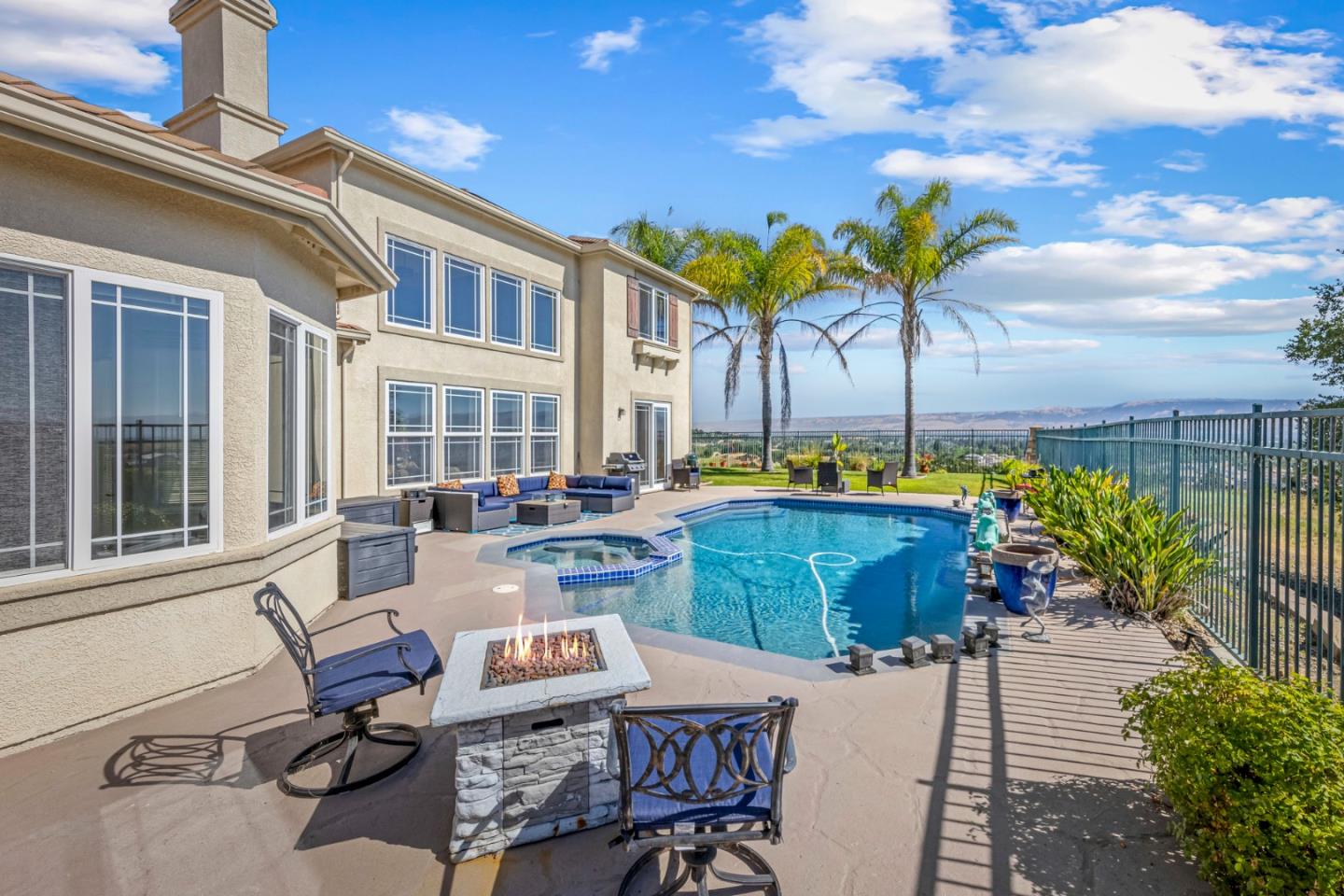 6850 Eagle Ridge Drive Gilroy, CA 95020 - Photo 32 of 51 a view of a chairs and table in patio with a fire pit