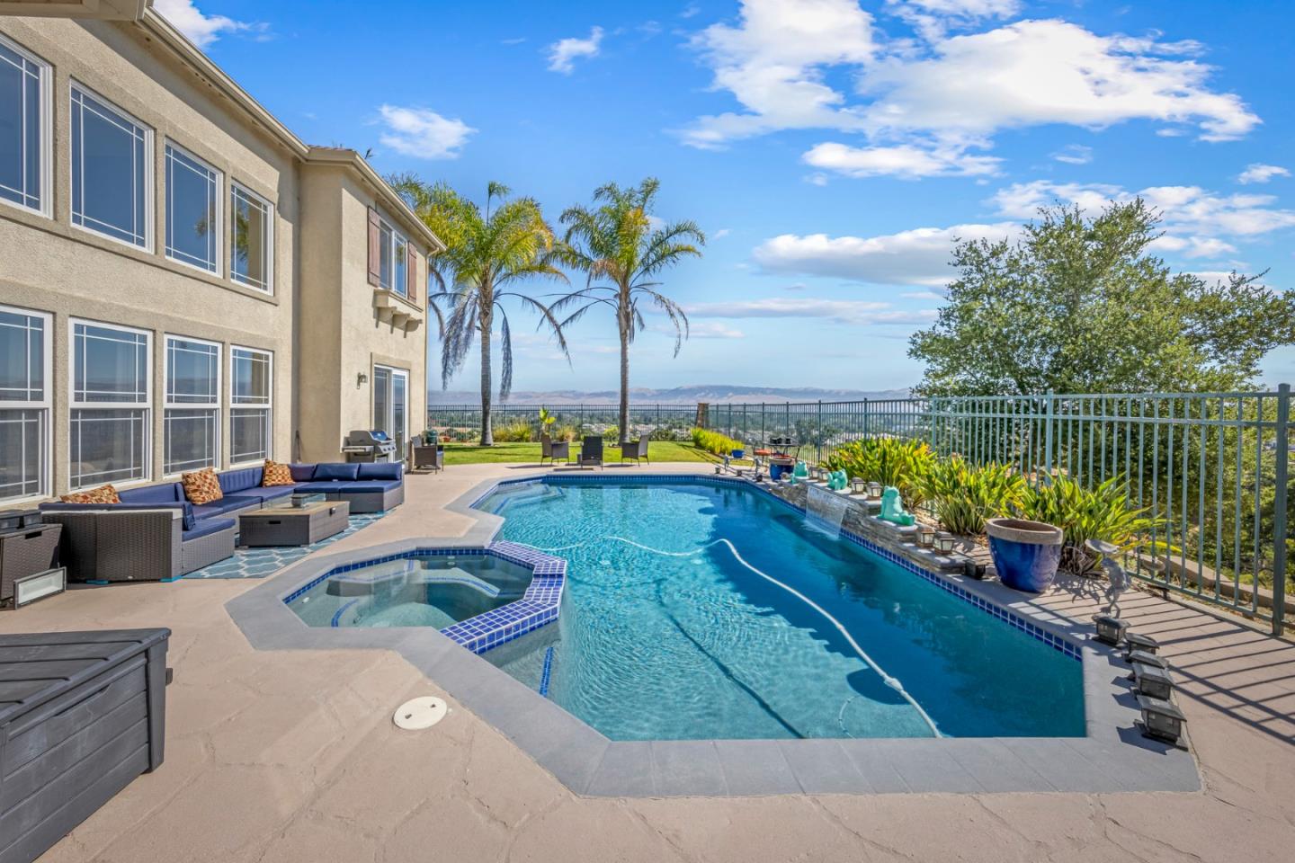 6850 Eagle Ridge Drive Gilroy, CA 95020 - Photo 33 of 51 a view of a swimming pool with a lounge chairs