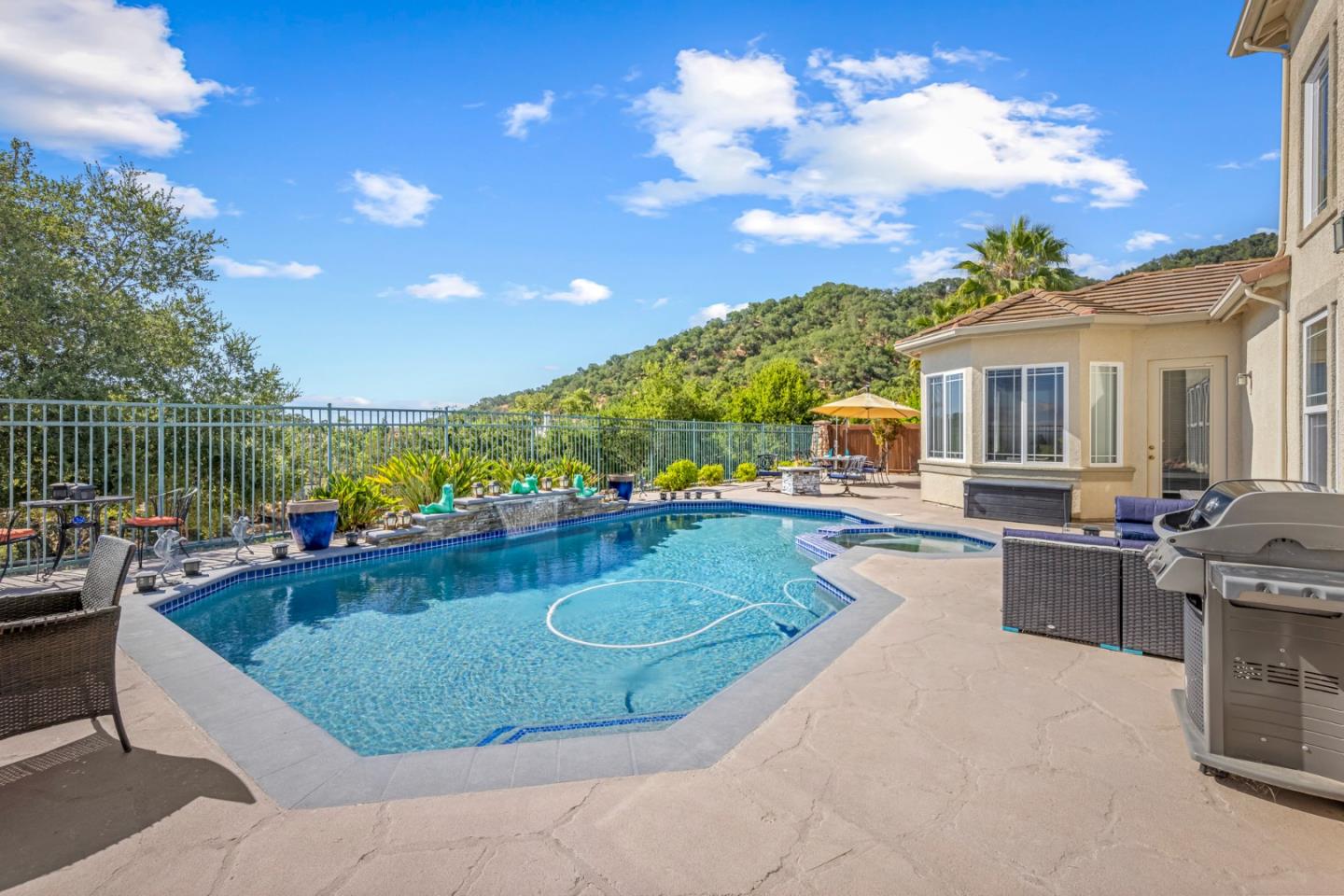 6850 Eagle Ridge Drive Gilroy, CA 95020 - Photo 35 of 51 a view of a swimming pool with a patio and a garden