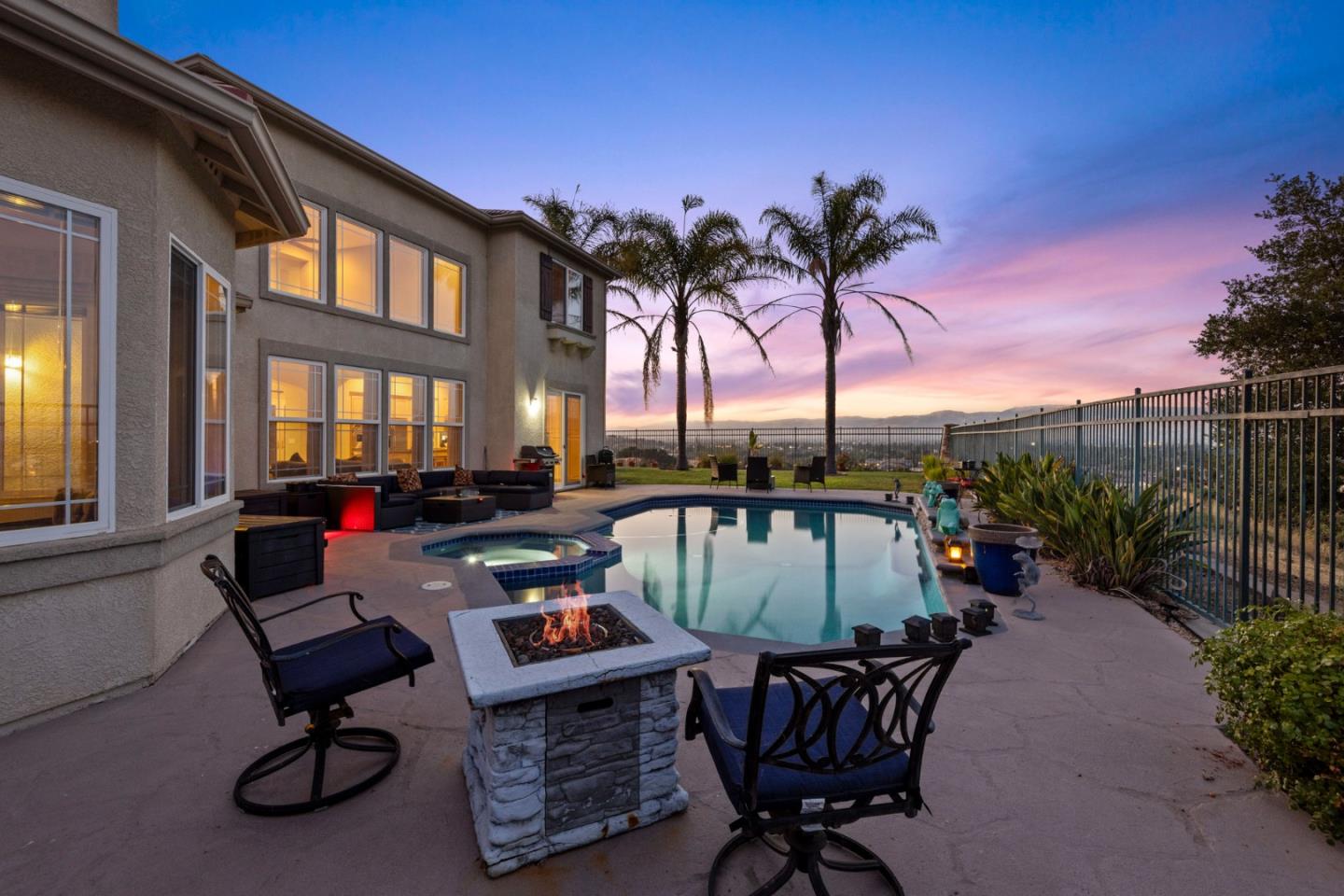6850 Eagle Ridge Drive Gilroy, CA 95020 - Photo 39 of 51 a view of a patio with couches table and chairs and potted plants