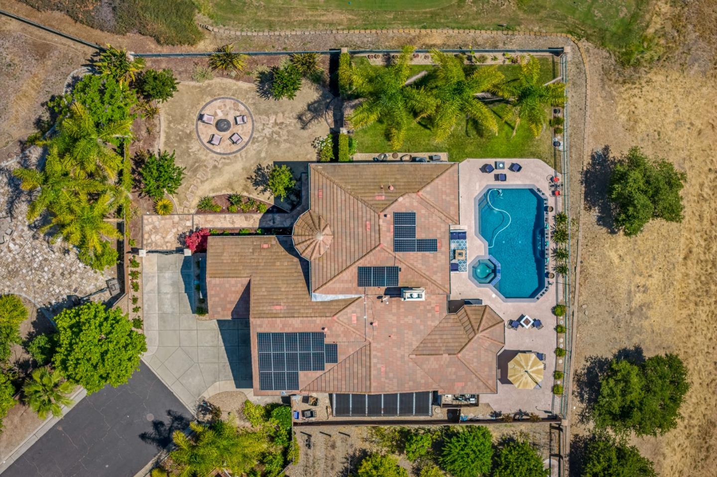 6850 Eagle Ridge Drive Gilroy, CA 95020 - Photo 48 of 51 an aerial view of a house with a garden and a sign