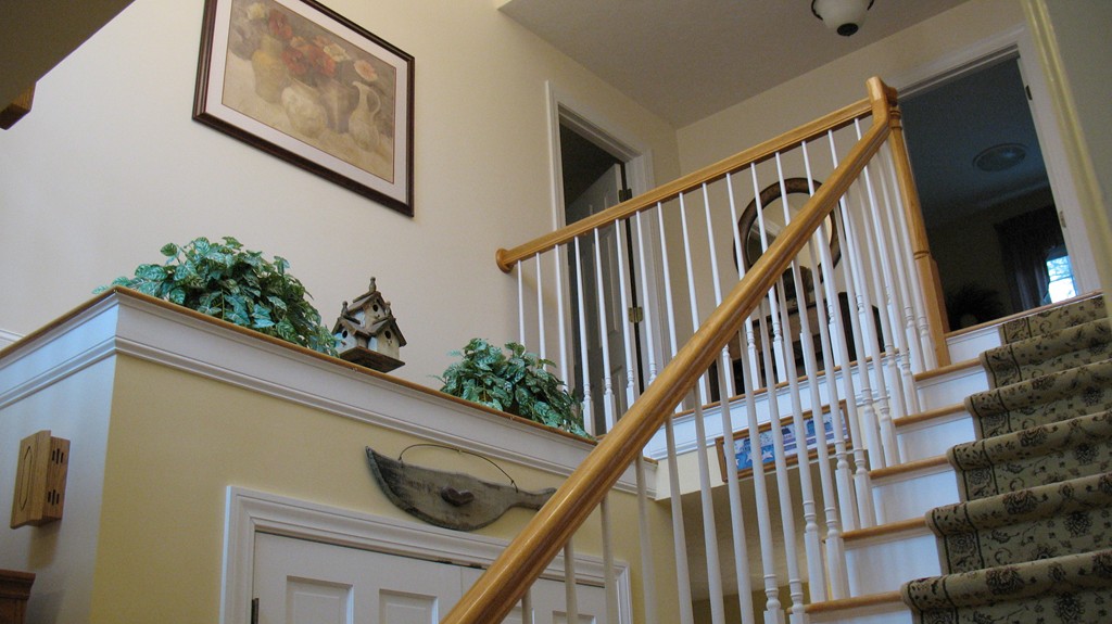 43 Shaker Road Shirley, MA 01464 - Photo 15 of 30 a view of staircase with wooden floor and potted plant