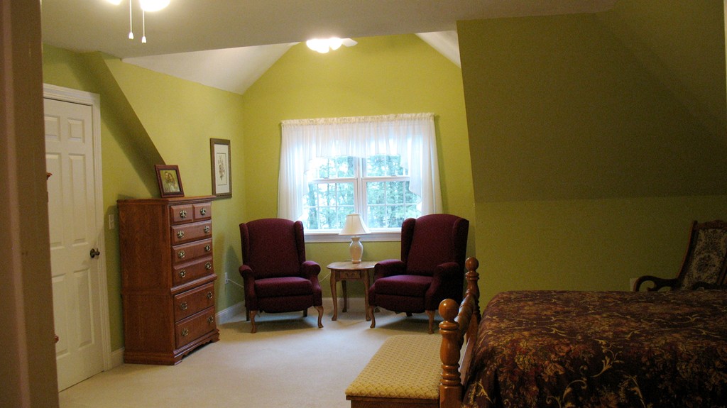 43 Shaker Road Shirley, MA 01464 - Photo 18 of 30 a living room with furniture and a window