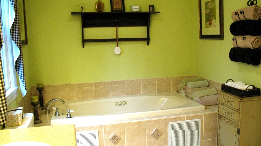 43 Shaker Road Shirley, MA 01464 - Photo 20 of 30 a bathroom with a sink and a bathtub