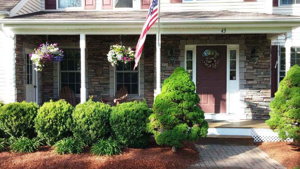 43 Shaker Road Shirley, MA 01464 - Photo 2 of 30 a front view of a house with a porch