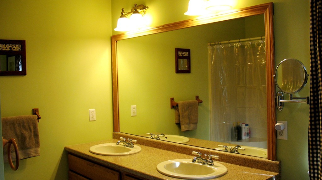 43 Shaker Road Shirley, MA 01464 - Photo 21 of 30 a bathroom with a sink mirror and shower