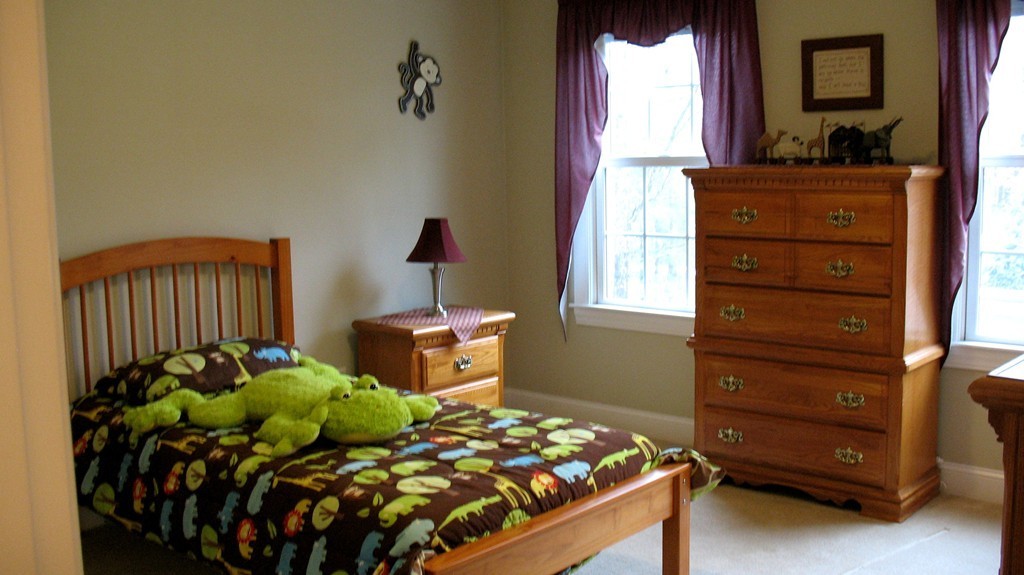 43 Shaker Road Shirley, MA 01464 - Photo 22 of 30 a bedroom with a bed and a dresser