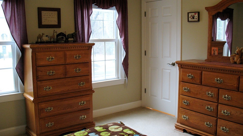 43 Shaker Road Shirley, MA 01464 - Photo 23 of 30 a room with a dresser and a mirror