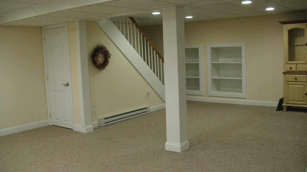 43 Shaker Road Shirley, MA 01464 - Photo 25 of 30 a view of a livingroom with a staircase