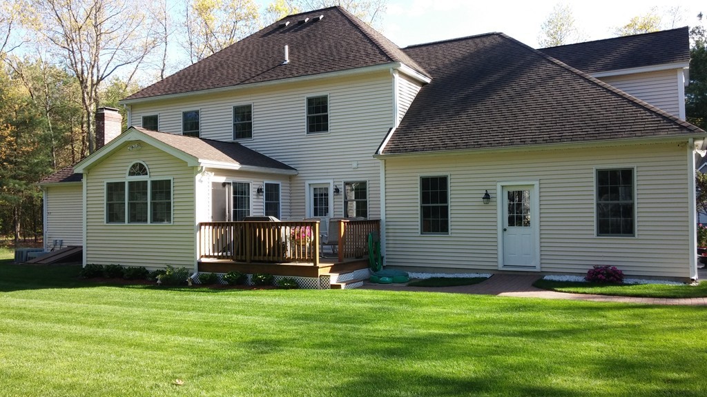 43 Shaker Road Shirley, MA 01464 - Photo 30 of 30 a front view of a house with a yard
