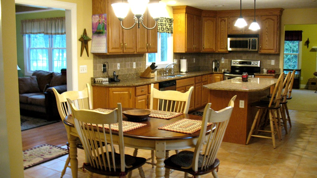 43 Shaker Road Shirley, MA 01464 - Photo 5 of 30 a view of a dining room with furniture