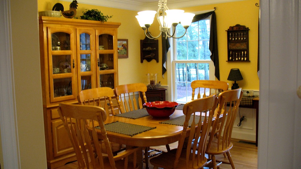 43 Shaker Road Shirley, MA 01464 - Photo 9 of 30 a view of a dining room with furniture and chandelier