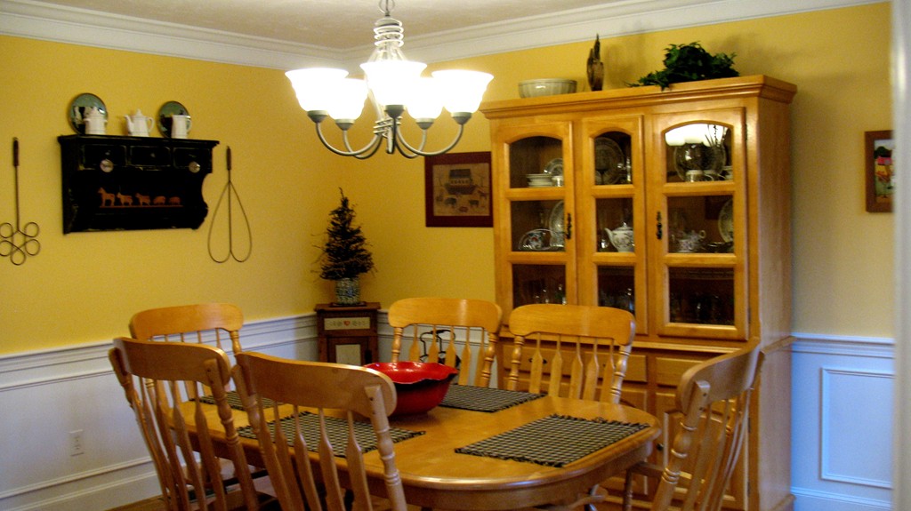 43 Shaker Road Shirley, MA 01464 - Photo 10 of 30 a view of a dining room with furniture and chandelier