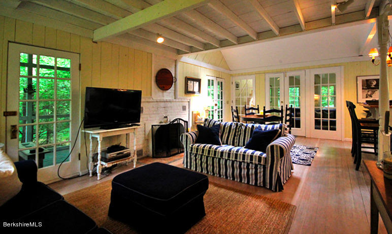 2 Grove Road Stockbridge, MA 01262 - Photo 2 of 25 a living room with furniture fireplace and flat screen tv