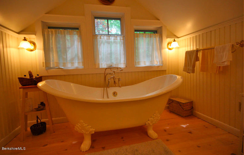 2 Grove Road Stockbridge, MA 01262 - Photo 12 of 25 a bathroom with a sink and a tub