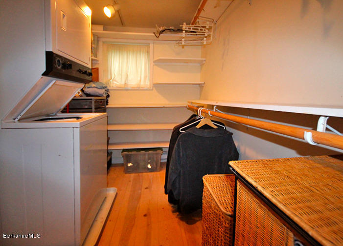 2 Grove Road Stockbridge, MA 01262 - Photo 13 of 25 a view of walk in closet with clothes and shoes