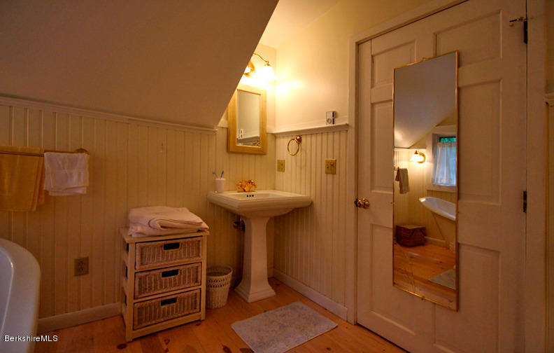 2 Grove Road Stockbridge, MA 01262 - Photo 14 of 25 a bathroom with a sink and a mirror
