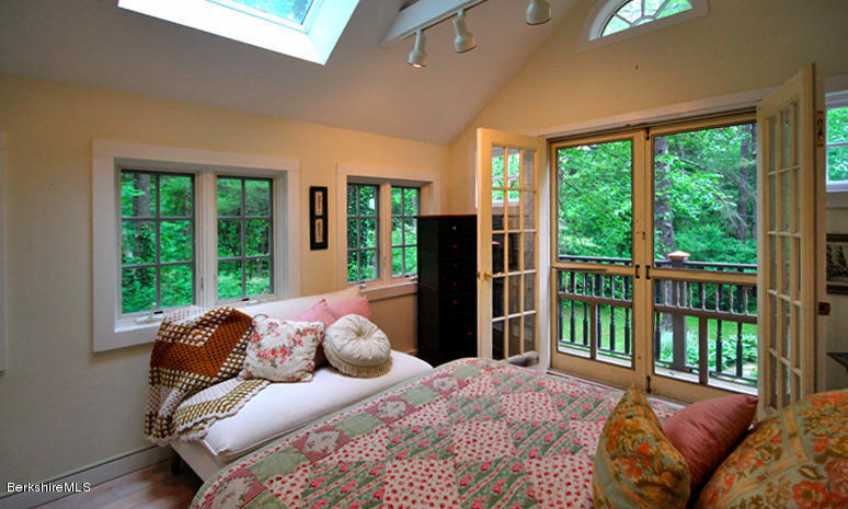 2 Grove Road Stockbridge, MA 01262 - Photo 15 of 25 a bedroom with a bed and a large window