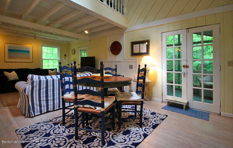 2 Grove Road Stockbridge, MA 01262 - Photo 4 of 25 a outdoor living space with furniture and a large window