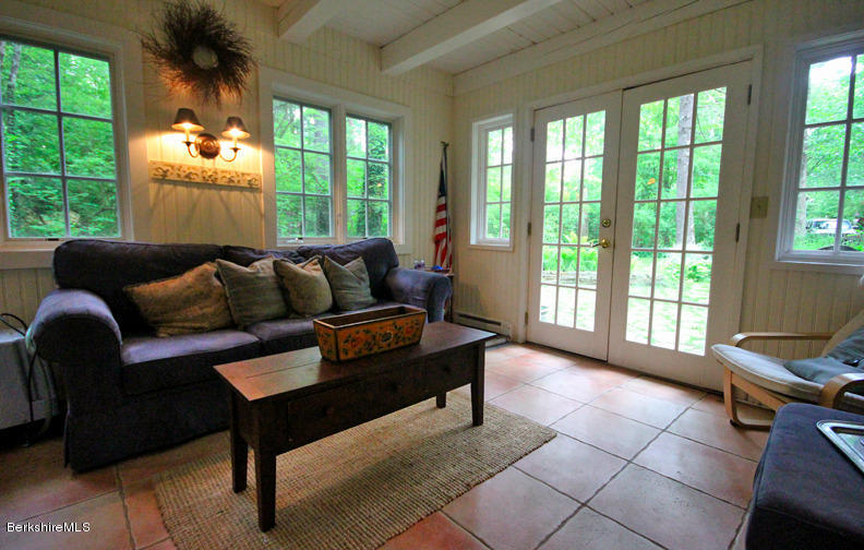 2 Grove Road Stockbridge, MA 01262 - Photo 7 of 25 a living room with furniture and a large window