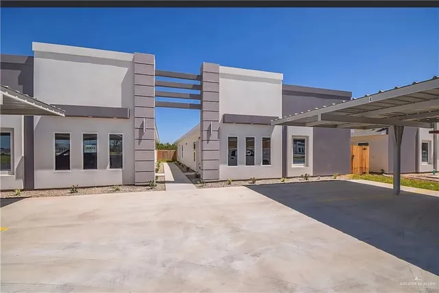 a view of a building with a street