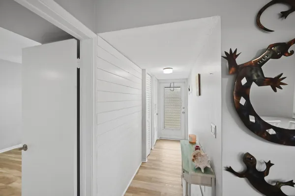 a view of a livingroom and entryway