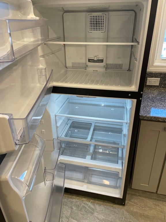 217 Washington Street, Unit 2L Lynn, MA 01902 - Photo 11 of 11 a view of rack