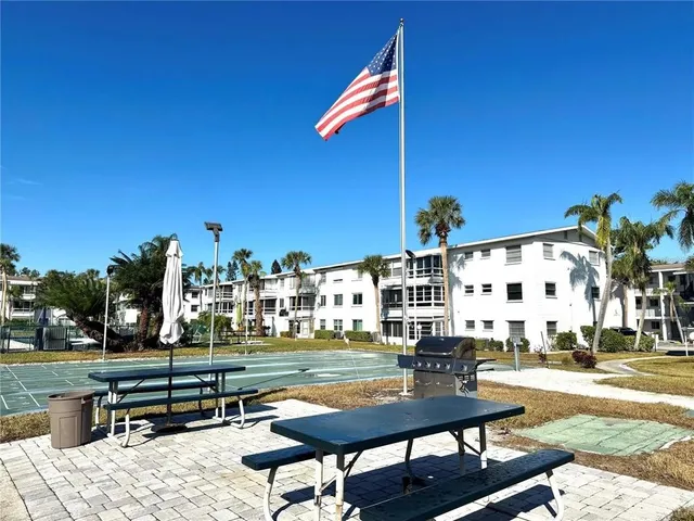 a view of a terrace with sitting area