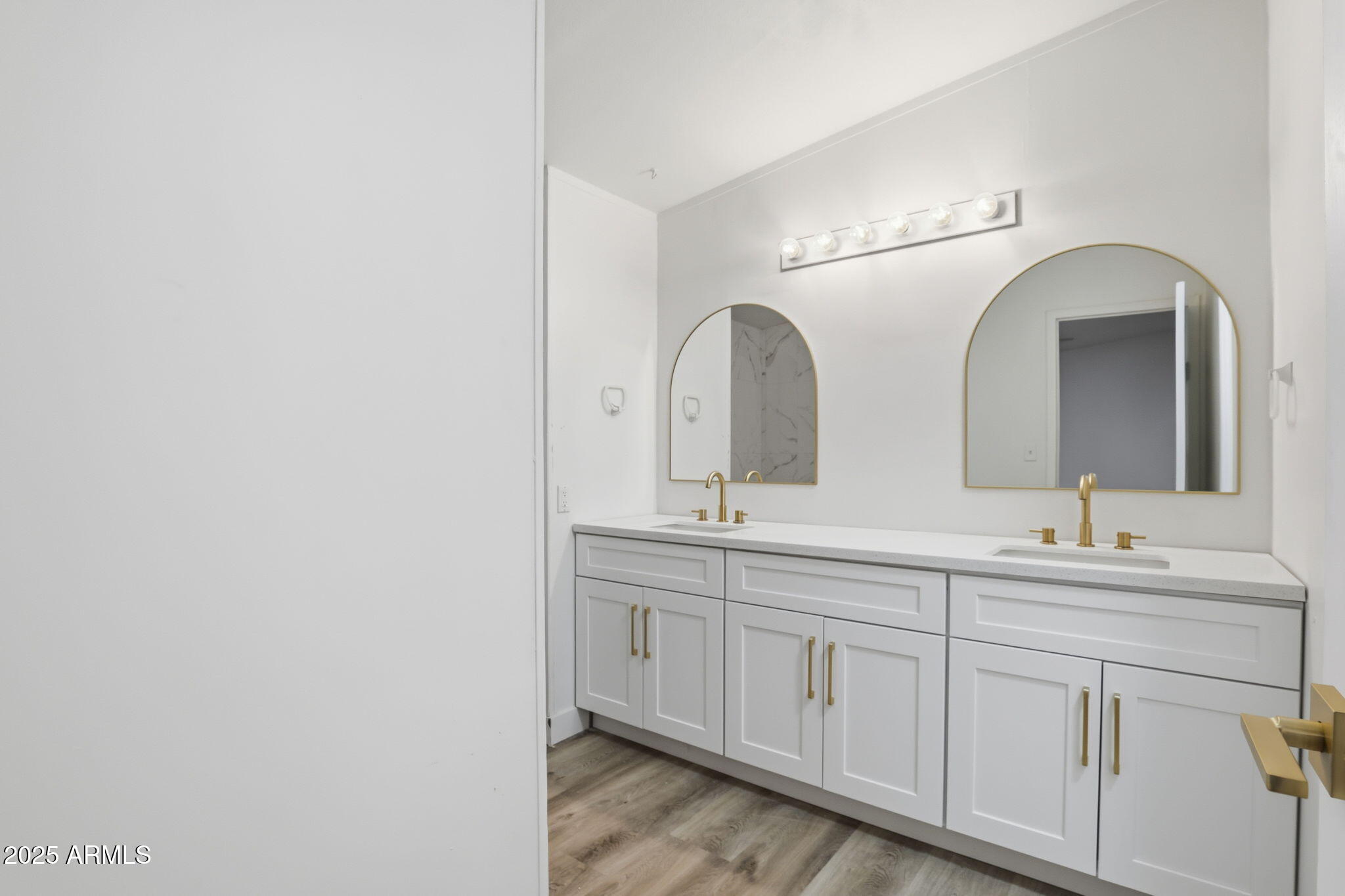 3500 South Tomahawk Road, Unit 142 Apache Junction, AZ 85119 - Photo 16 of 38 a bathroom with a double vanity sink and a mirror