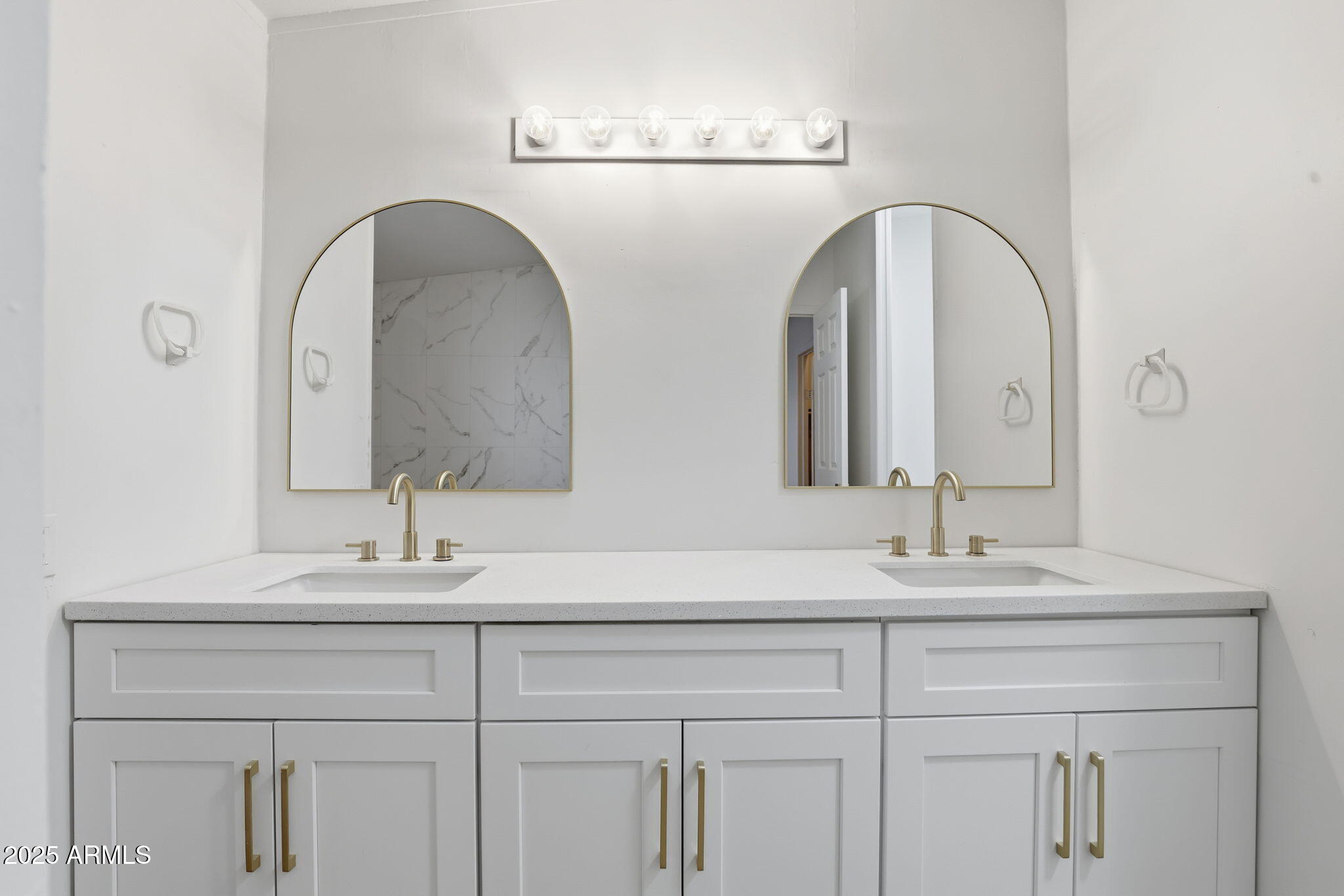 3500 South Tomahawk Road, Unit 142 Apache Junction, AZ 85119 - Photo 17 of 38 a bathroom with a double vanity sink and a mirror