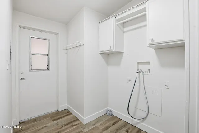 a room with white walls and white walls