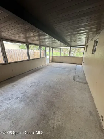 a view of a backyard with a patio