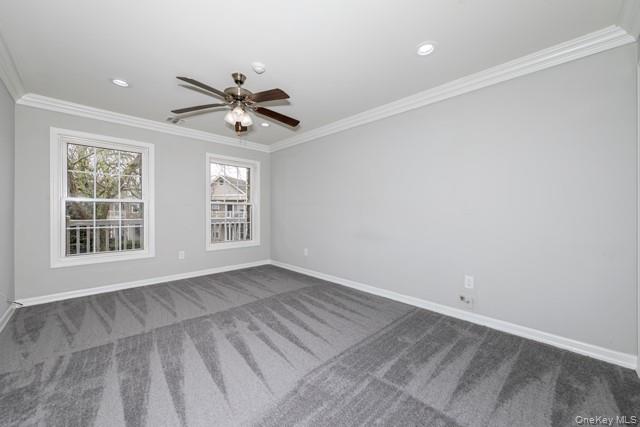 1703 Montauk Highway, Unit 1723 Moriches, NY 11955 - Photo 8 of 9 a view of an empty room with a window