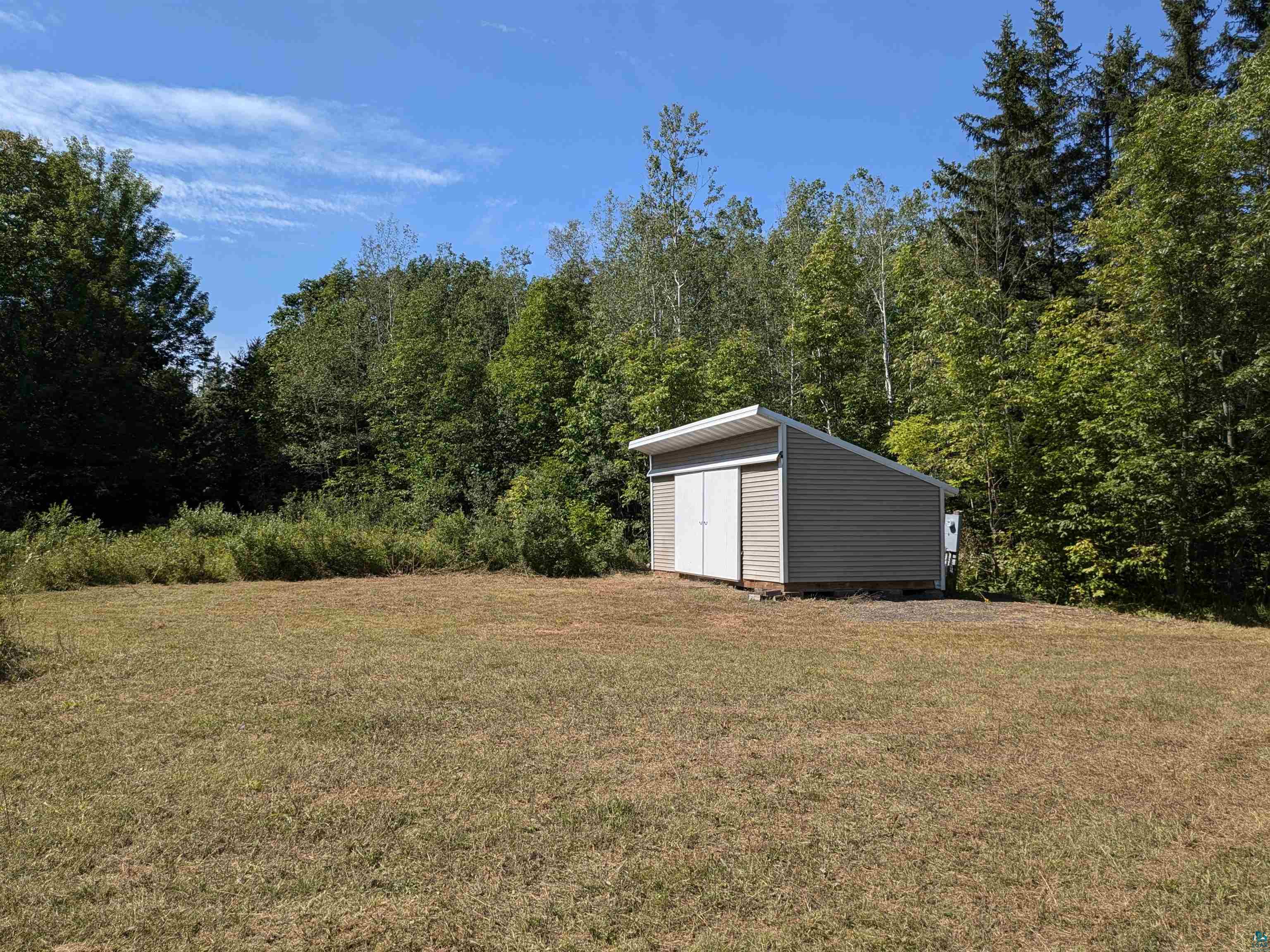 7163 W Highway 2 Hurley, WI 54534 - Photo 1 of 13 View of yard with a shed