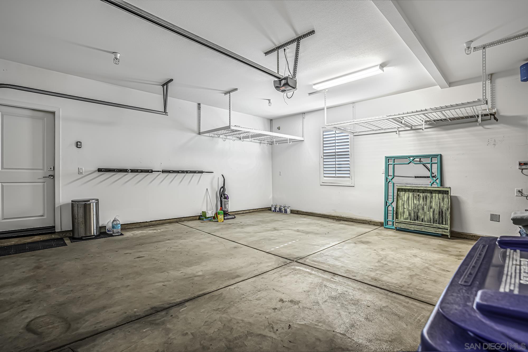 145 Stonesteps Way Encinitas, CA 92024 - Photo 19 of 25 a view of a garage