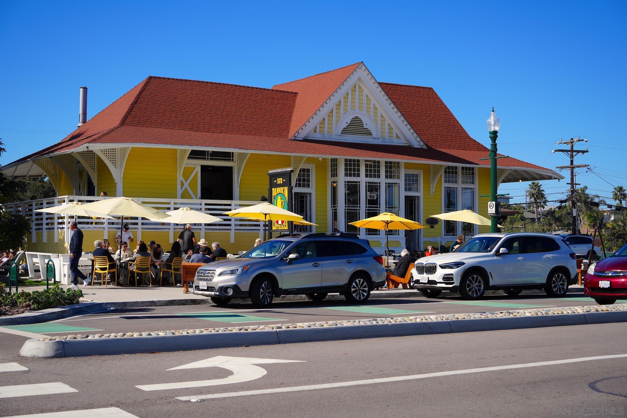 145 Stonesteps Way Encinitas, CA 92024 - Photo 25 of 25 a front view of a building with cars parked