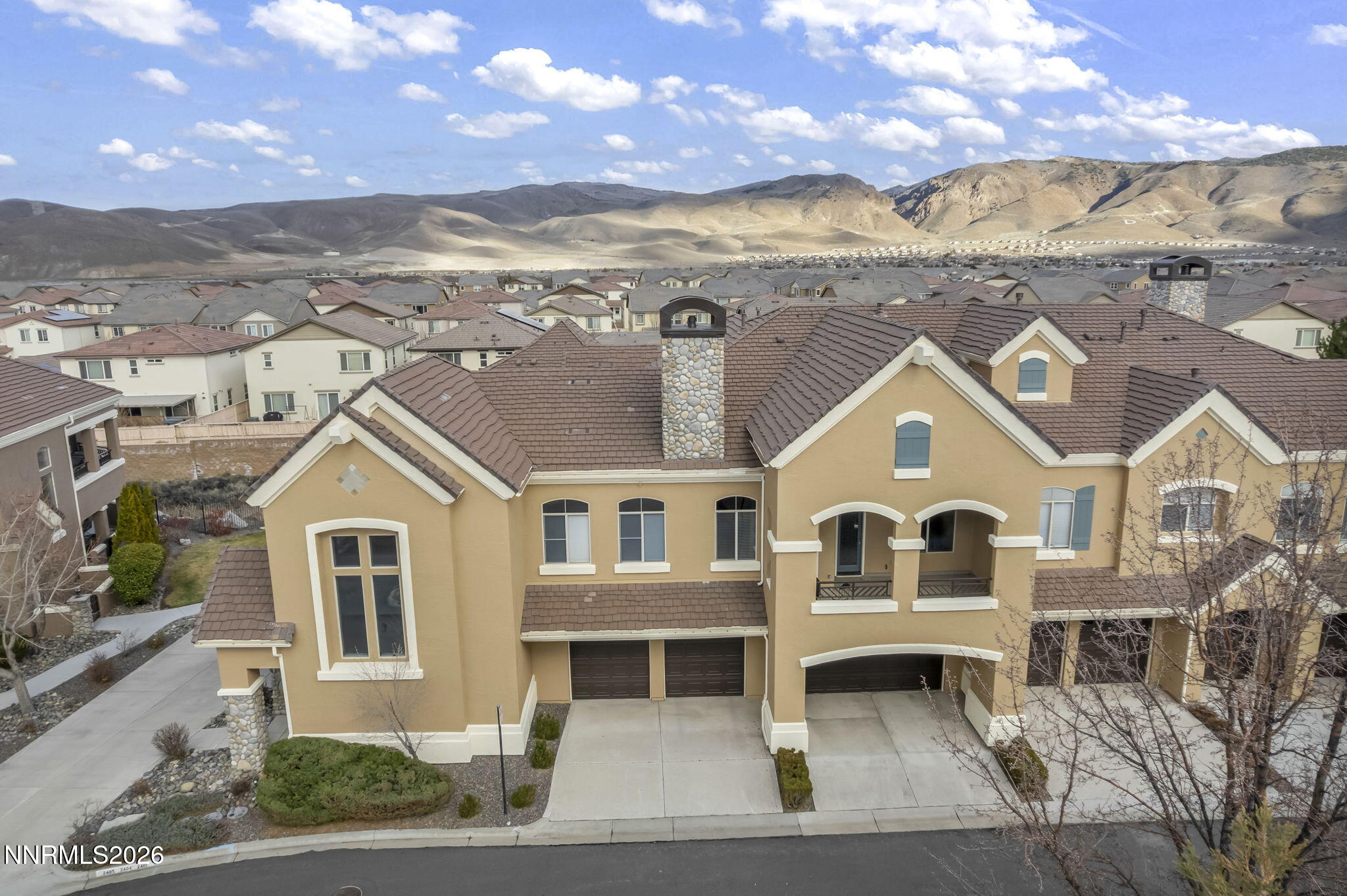 9900 Wilbur May Parkway, Unit 2405 Reno, NV 89521 - Photo 12 of 81 a view of house with a garden