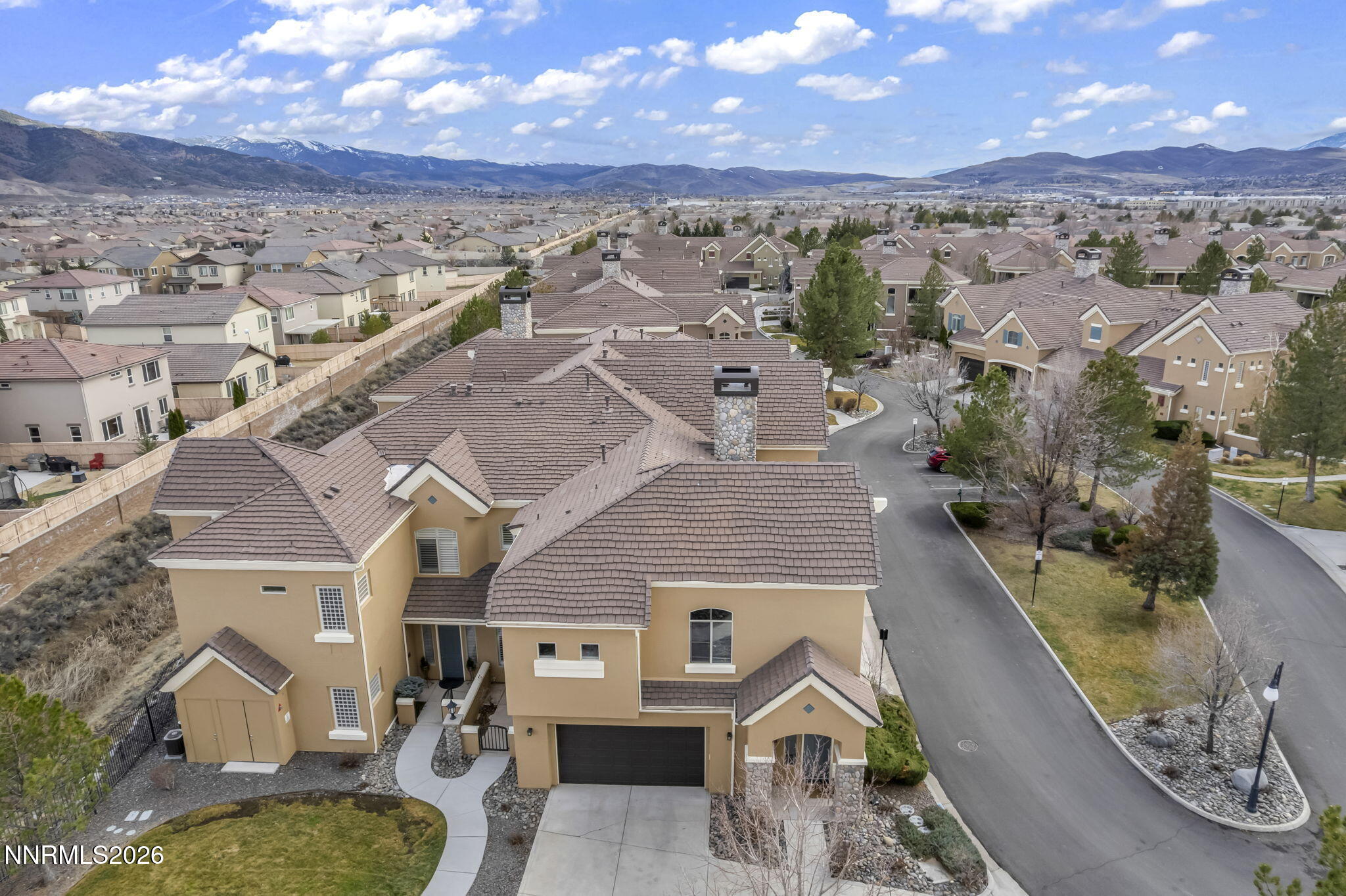 9900 Wilbur May Parkway, Unit 2405 Reno, NV 89521 - Photo 15 of 81 an aerial view of a house with a mountain