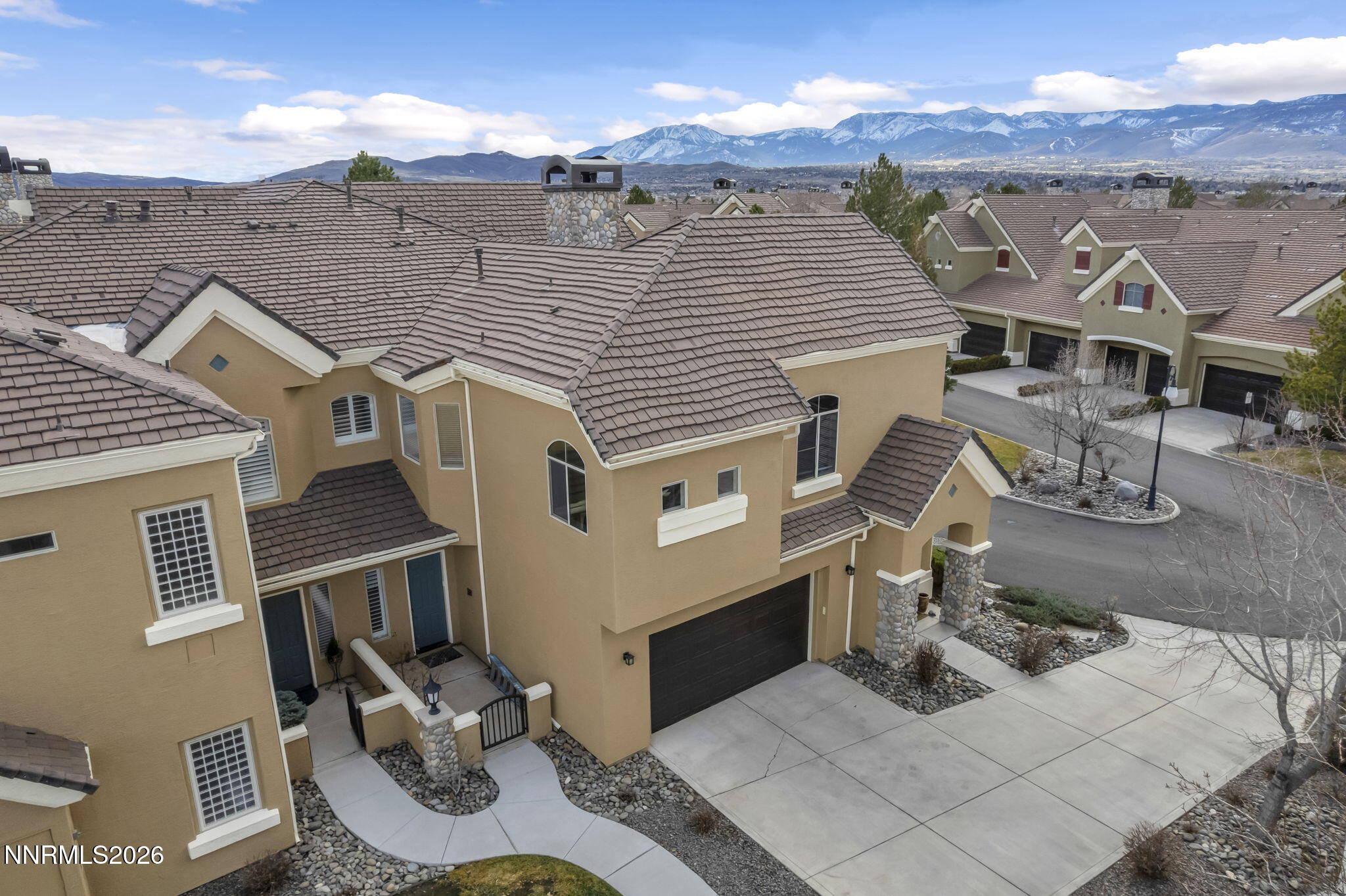 9900 Wilbur May Parkway, Unit 2405 Reno, NV 89521 - Photo 16 of 81 an aerial view of a house with large trees
