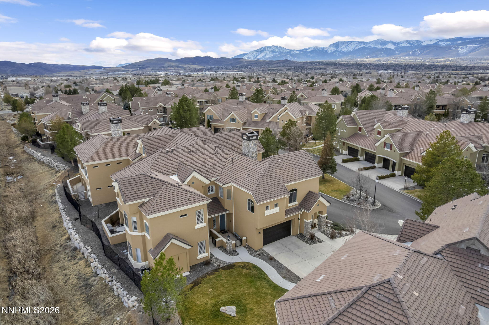 9900 Wilbur May Parkway, Unit 2405 Reno, NV 89521 - Photo 21 of 81 an aerial view of residential houses with outdoor space