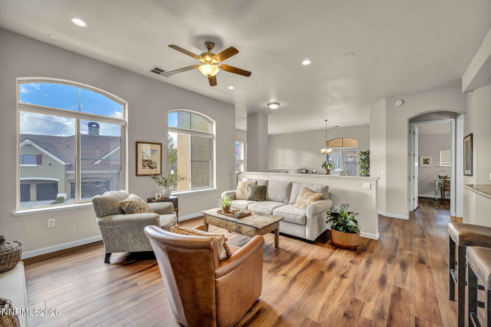 9900 Wilbur May Parkway, Unit 2405 Reno, NV 89521 - Photo 22 of 81 a living room with furniture and wooden floor