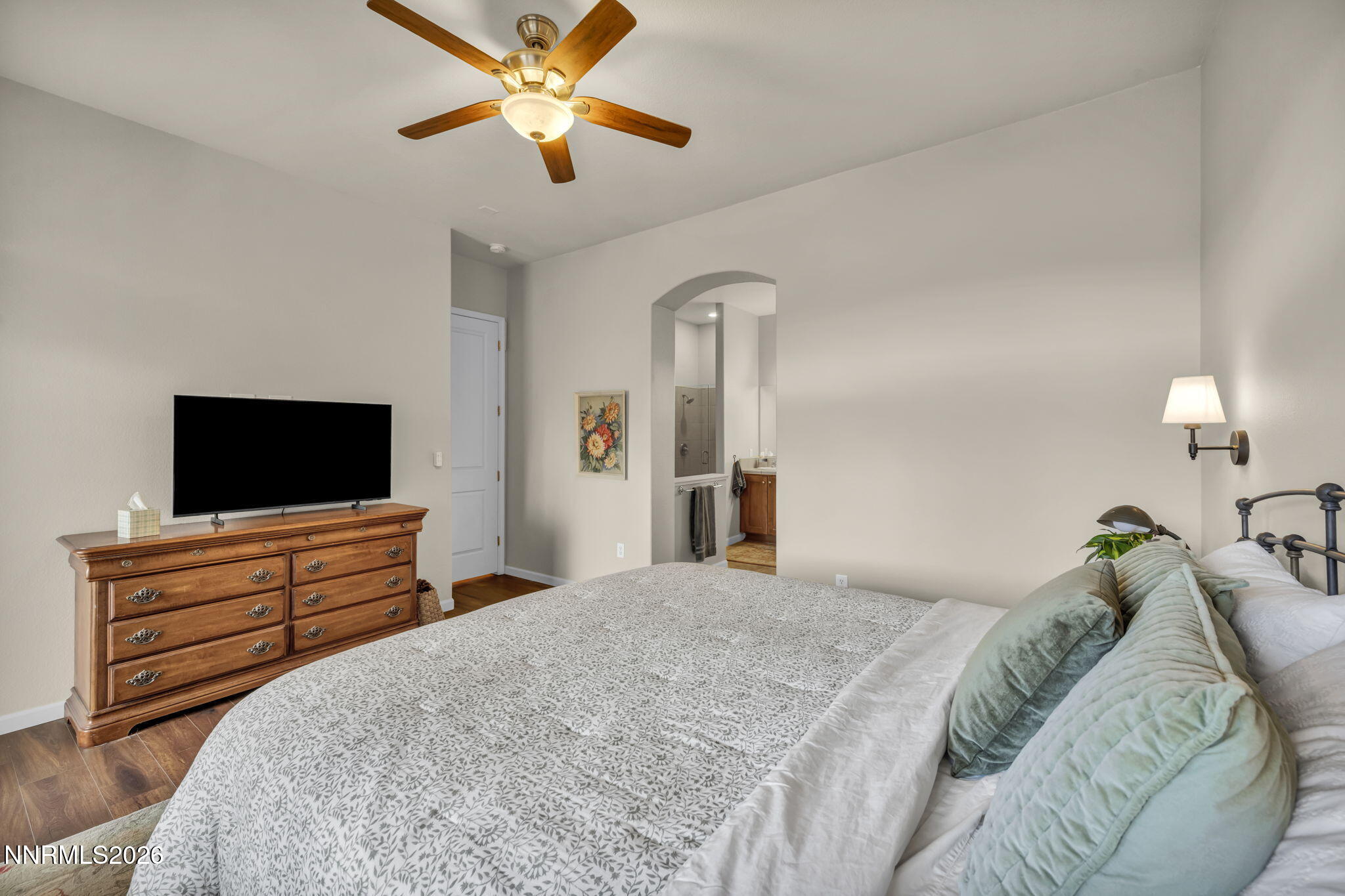 9900 Wilbur May Parkway, Unit 2405 Reno, NV 89521 - Photo 49 of 81 a bedroom with a bed and a flat screen tv