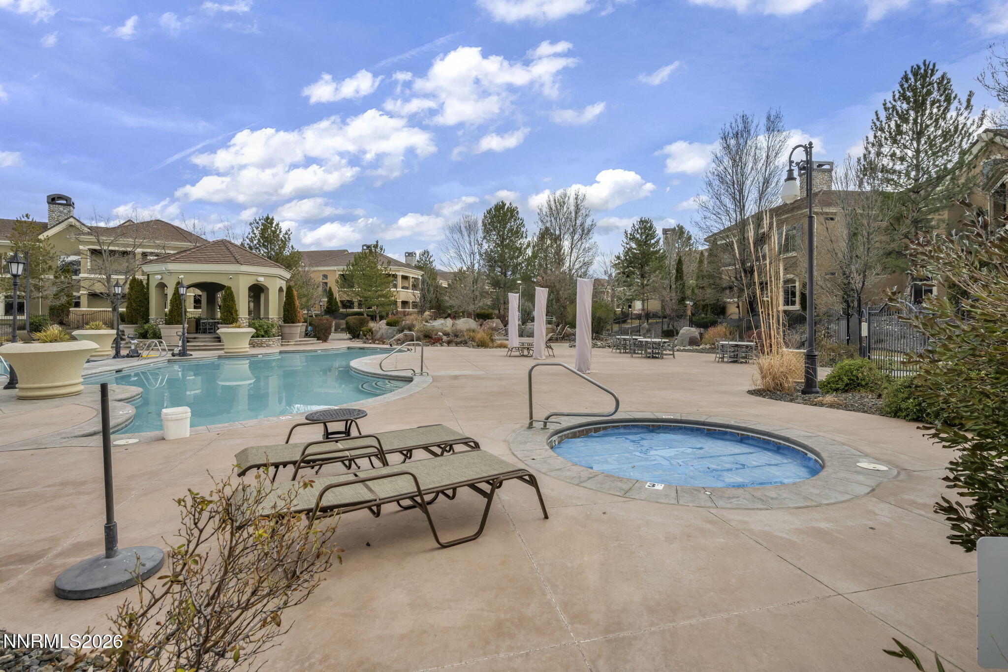 9900 Wilbur May Parkway, Unit 2405 Reno, NV 89521 - Photo 5 of 81 a view of a lake with a house
