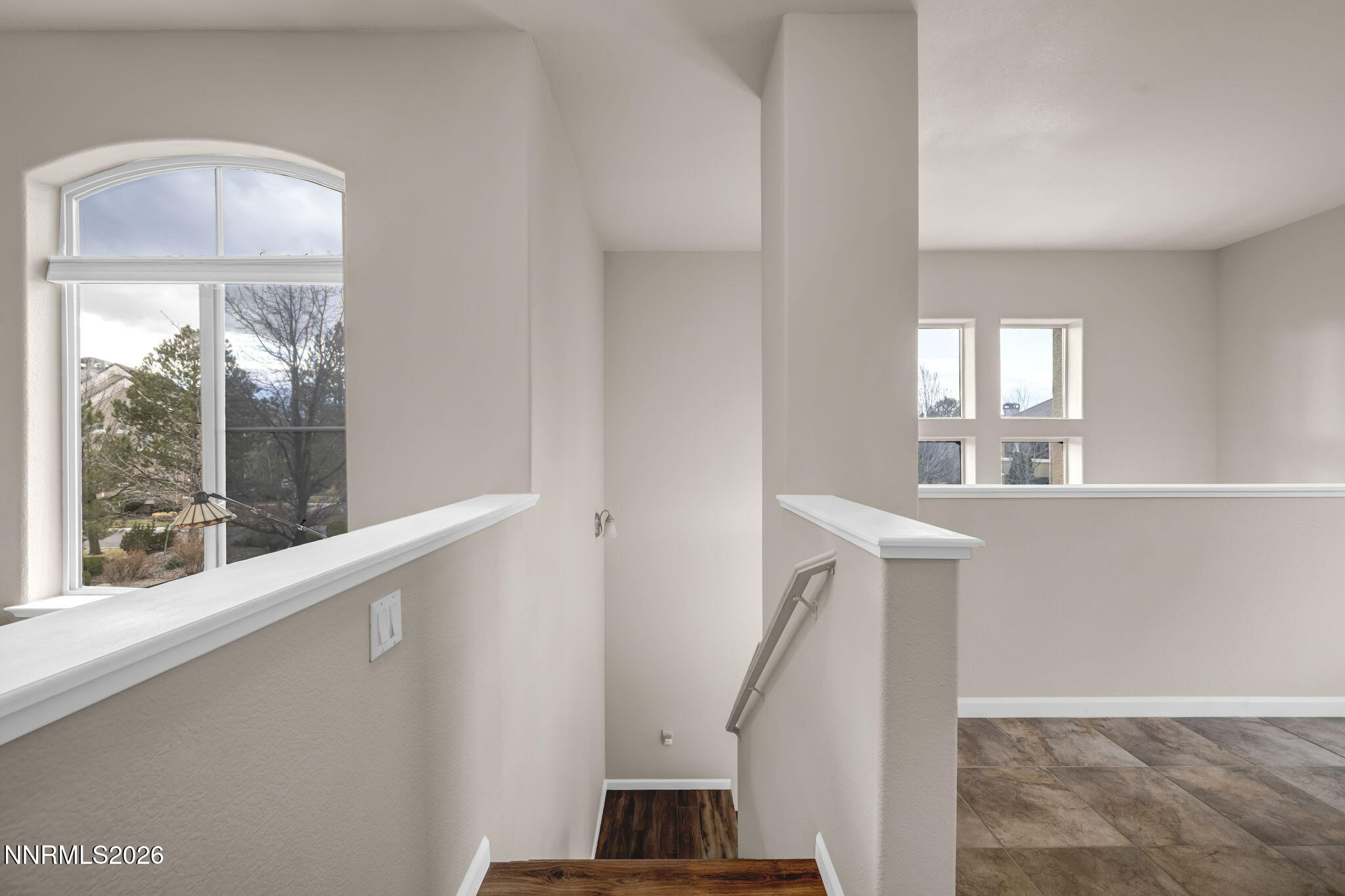 9900 Wilbur May Parkway, Unit 2405 Reno, NV 89521 - Photo 64 of 81 a view of entryway with a window and wooden floor