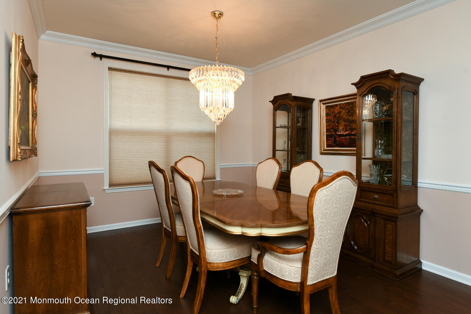 33 Comtois Road Manalapan, NJ 07726 - Photo 15 of 26 a dining room with furniture and chandelier