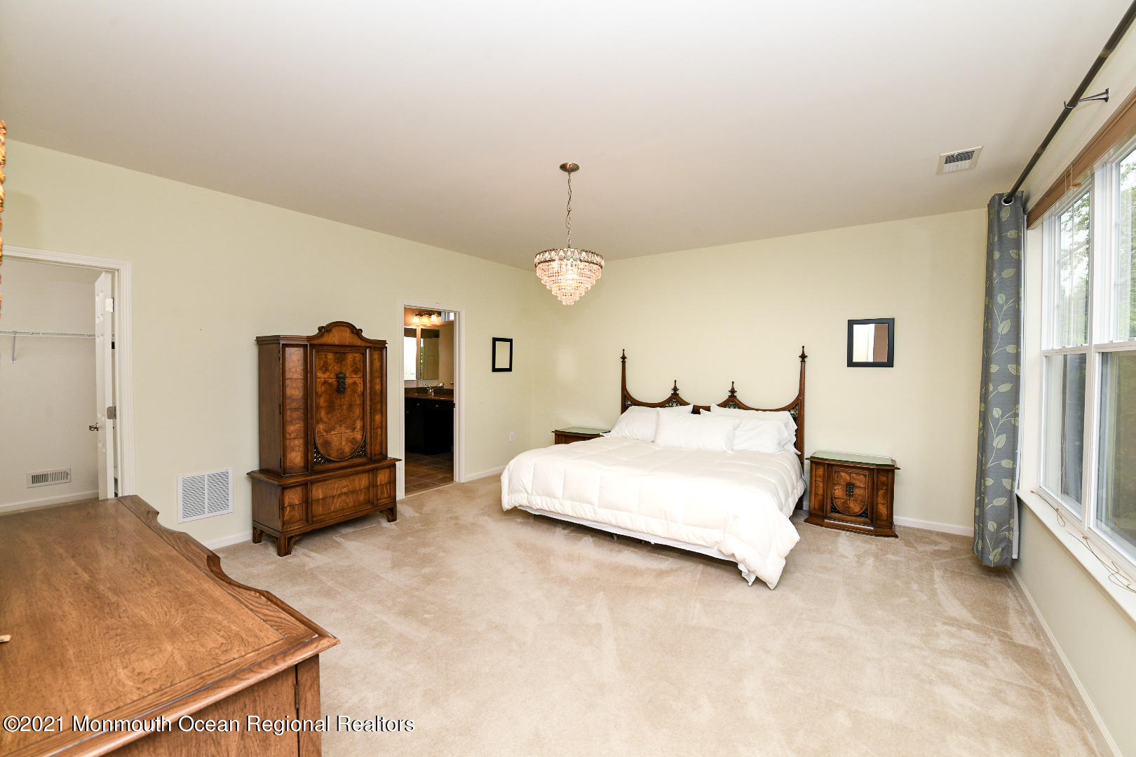 33 Comtois Road Manalapan, NJ 07726 - Photo 16 of 26 a spacious bedroom with a bed and dresser
