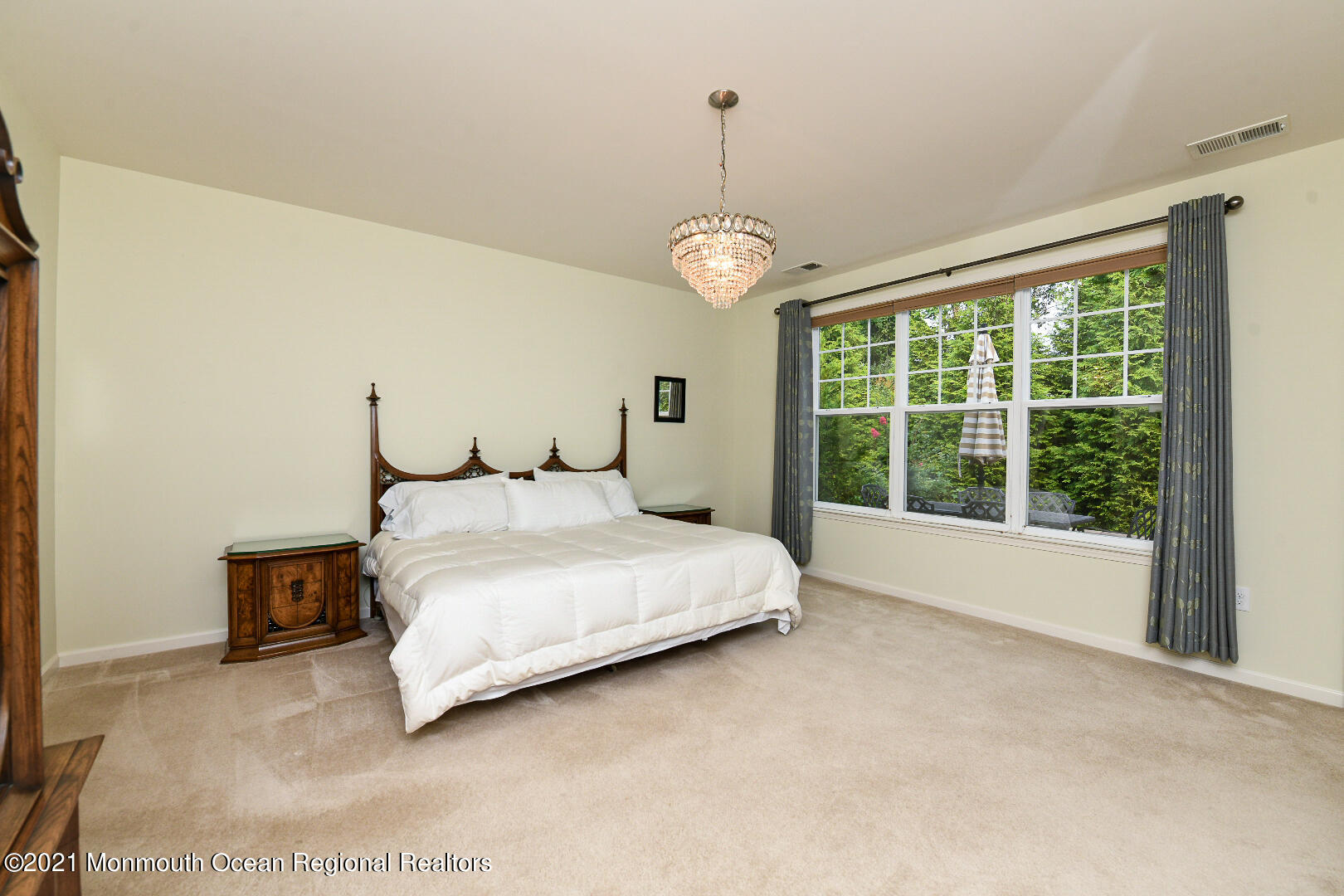 33 Comtois Road Manalapan, NJ 07726 - Photo 17 of 26 a large bed sitting in a room next to a window