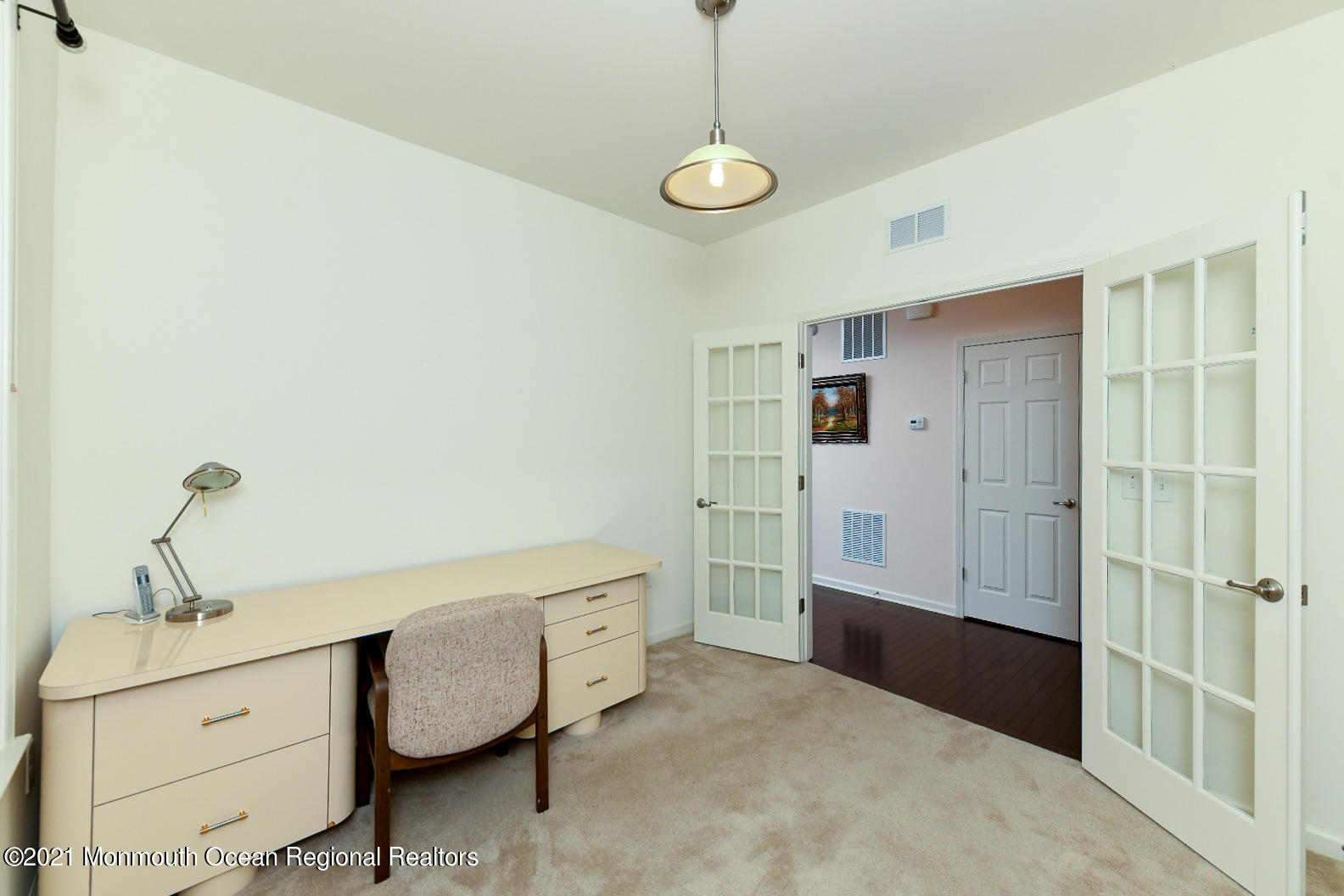 33 Comtois Road Manalapan, NJ 07726 - Photo 24 of 26 a spacious bedroom with a bed and a dresser