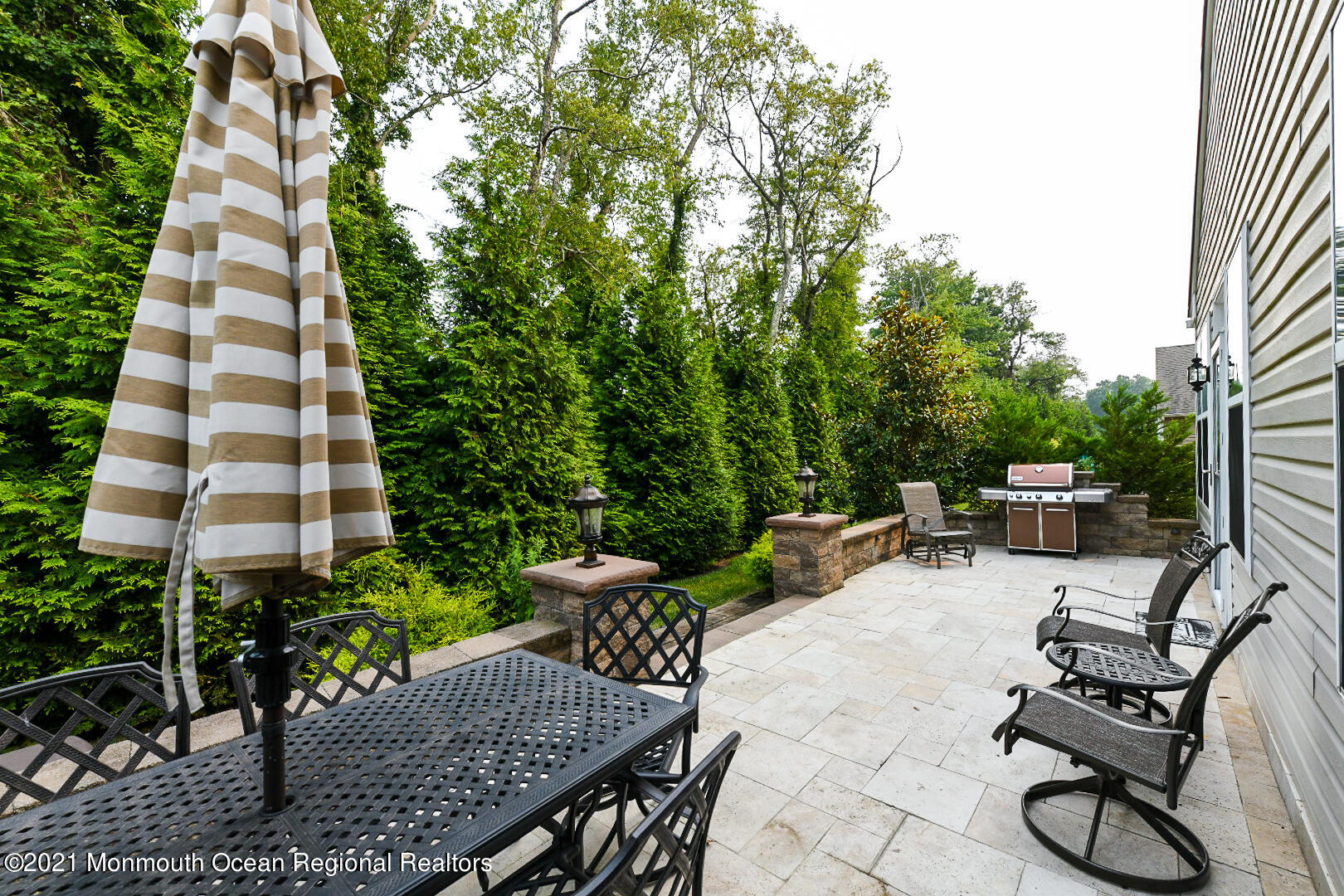 33 Comtois Road Manalapan, NJ 07726 - Photo 26 of 26 a view of a backyard with sitting area