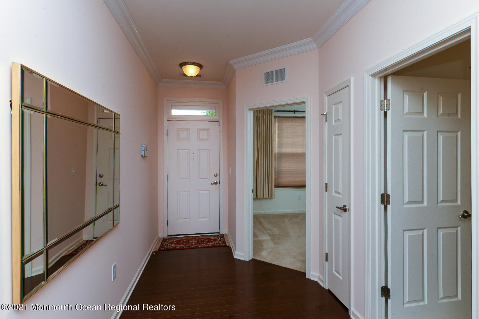 33 Comtois Road Manalapan, NJ 07726 - Photo 5 of 26 a view of a hallway with a room